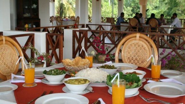 Hibiscus Garden Hotel تيساماهاراما المطعم الصورة